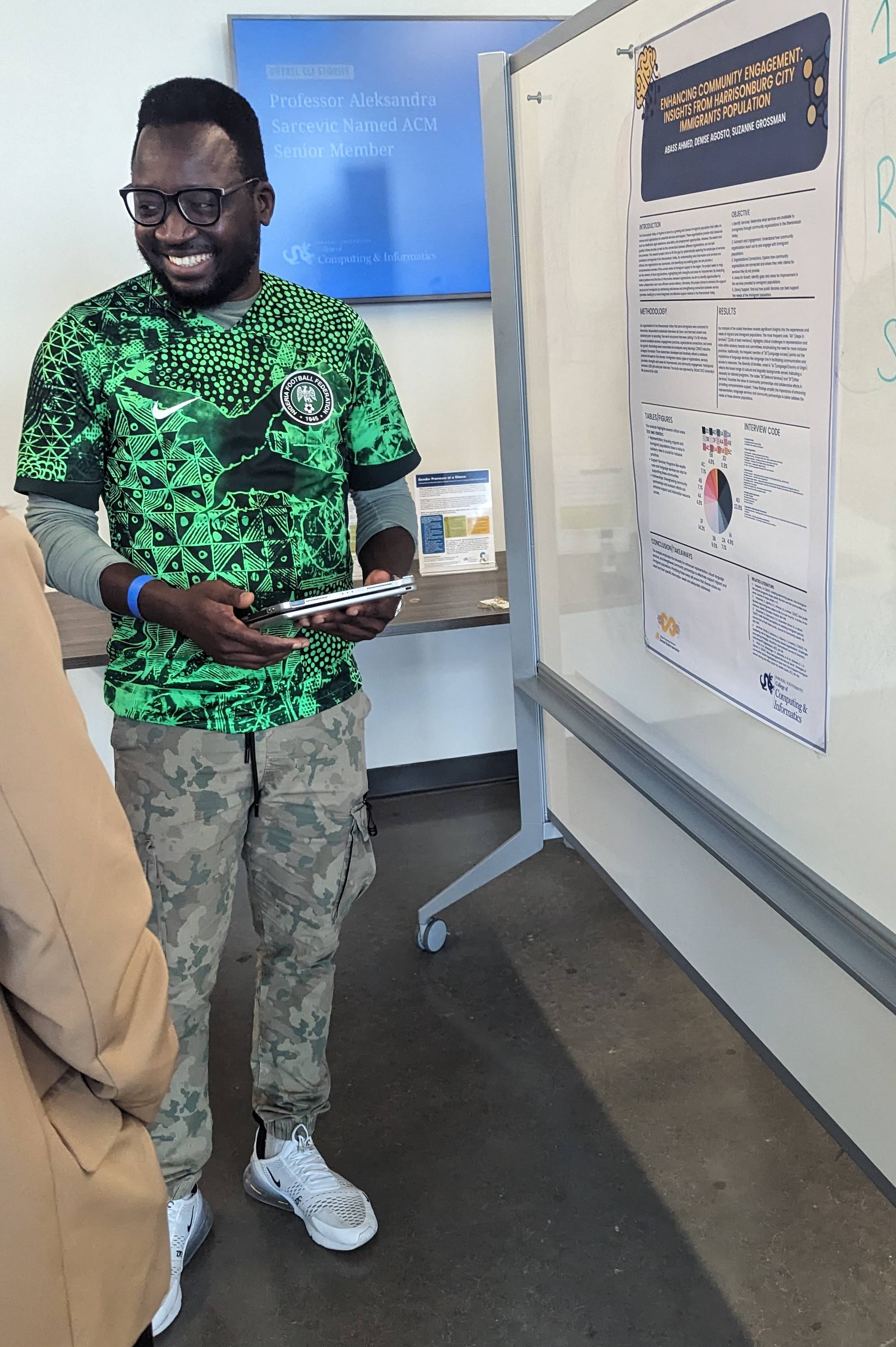 Abass presenting his poster >